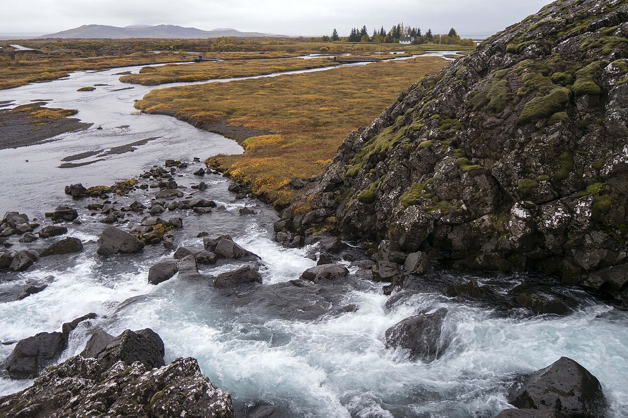 An Icelandic landscape of plain and rocks.